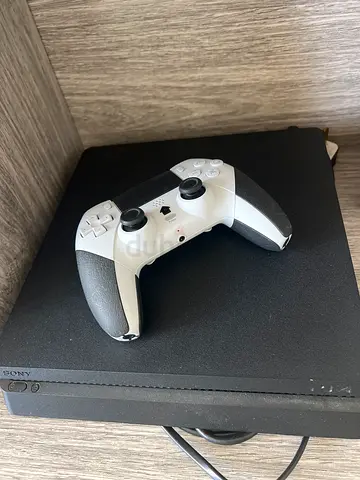 Sony PlayStation 4 Slim with DualShock Controller - Good Condition