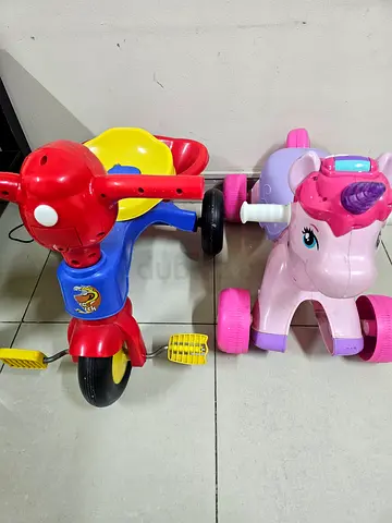Two kids ride-on toys (unicorn and tricycle) - good used condition