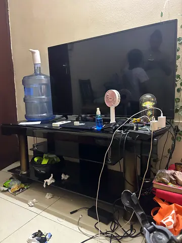 Table with Tv for sale