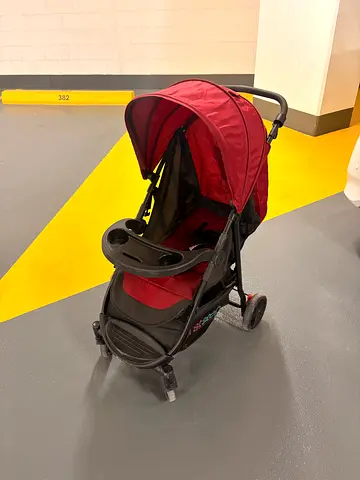 Red lightweight umbrella stroller with tray - good condition