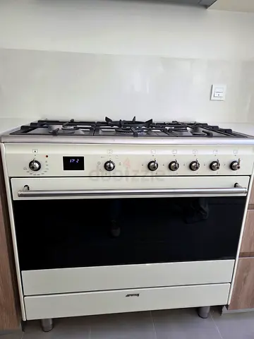 Smeg 5-burner gas stove with oven (cream/white) - good condition. 12-18months old. Moving out sale