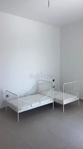 Ikea single beds adjust able