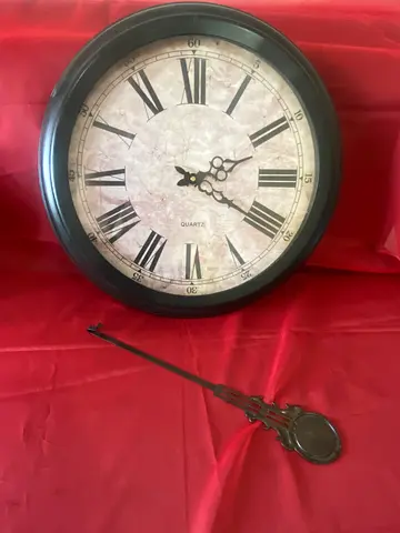 Wall clock with pendulum