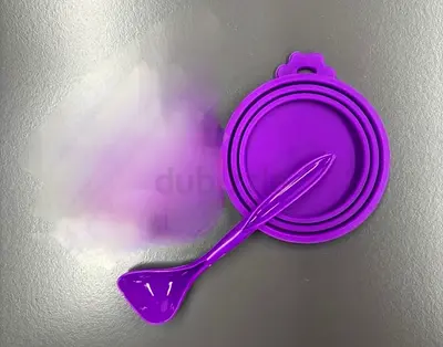 Silicon lid and spoon. Brand New. Still in Original Packaging.