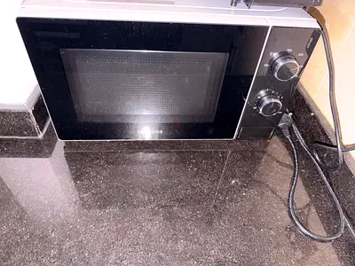 Used Samsung Countertop Microwave with Mechanical Dials - Good Working Condition