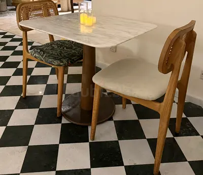 Marble Tables  Wooden Chairs