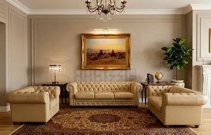 Classic beige Chesterfield sofa set with traditional Persian-style rug
