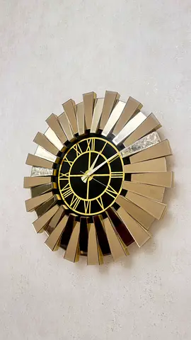 Modern Sunburst Wall Clock with Mirrored Accents