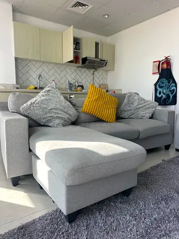 L-Shaped Grey Sectional Sofa  sofa bed with table and tv table and carpet