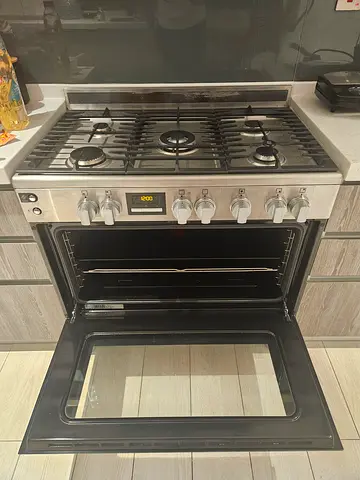 Stainless steel 5-burner gas range - good condition