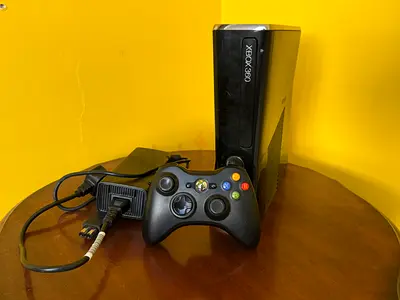 Xbox 360 Slim with Controller and Power Supply and with built in games