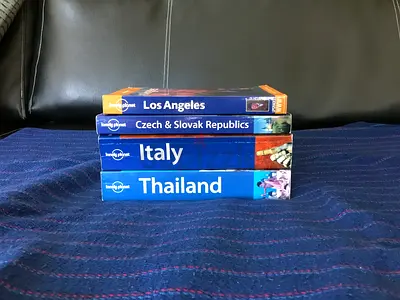 4 LONELY PLANET TRAVEL GUIDES