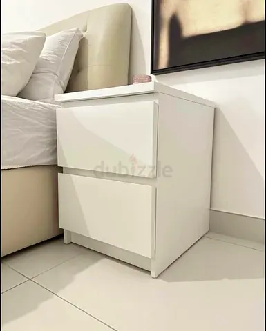 2 nightstands for 100 aed , White 2-Drawer Bedside Nightstand - Modern Minimalist