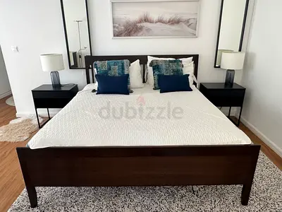 (New condition) Ikea Dark Wood Double Bed Frame with Headboard and Slats