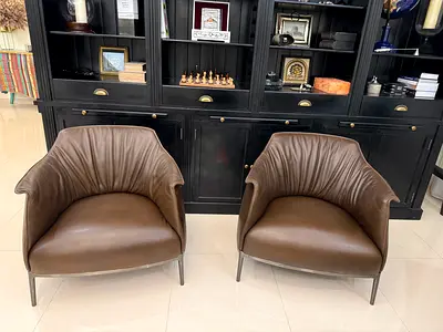 x2 POLTRONA FRAU Archibald Leather Armchairs in dark brown leather with chrome plated metal base