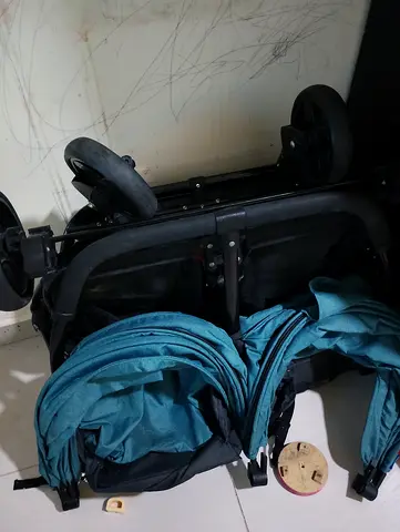 Twin double stroller - foldable, teal seats (for parts or repair)