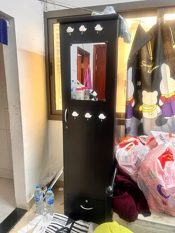 2 Tall brown wardrobes and 2 single beds