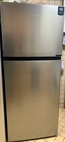 Double-door refrigerator in excellent condition (1 month old)