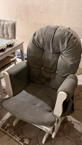 Grey padded rocking/glider armchair - used, good condition