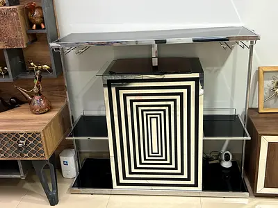 Modern chrome and glass console table with wine glass rack