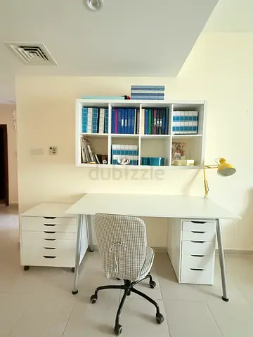 White desk with matching shelving and drawer units — good condition