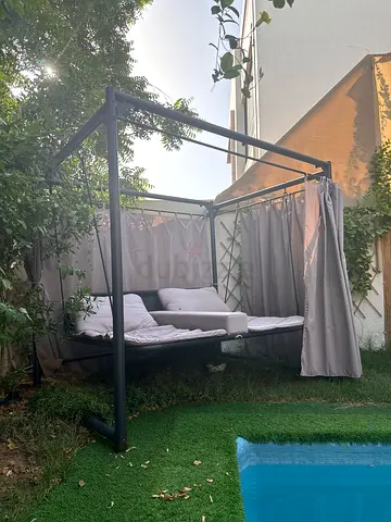 Outdoor four-poster daybed with curtains - good condition