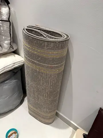 Rolled grey patterned area rug - like new