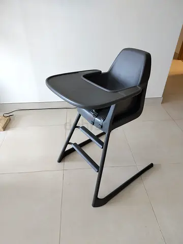 Simple grey plastic baby high chair - sturdy and easy to clean