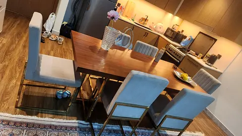 Modern wooden dining table with 6 upholstered chairs - good condition