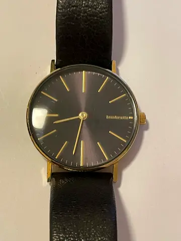 Classic minimalist mens wristwatch with black leather strap