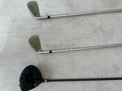 Used golf driver + 2 irons set — good condition