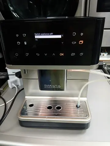 Miele CM 6360 countertop coffee machine in obsidian black and stainless steel.This fully automatic m