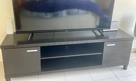 Dark wood TV unit / entertainment center with storage