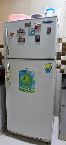 Used double-door refrigerator in good working condition