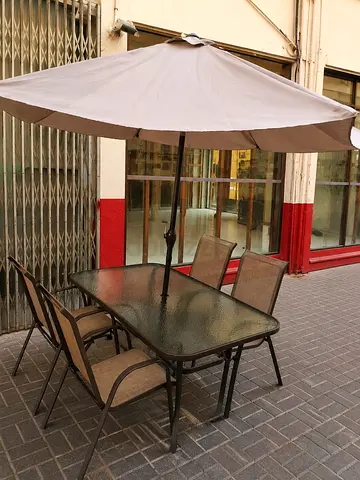 We are selling used Garden  dining table 4 chair with  umbrella and all very nice for sell