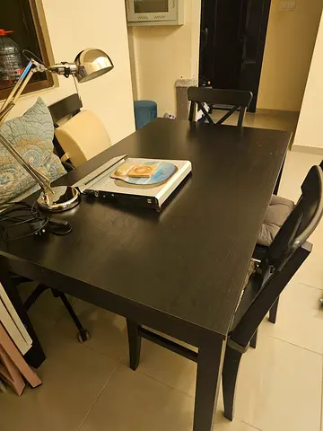 Dark wood dining table with chairs - good condition