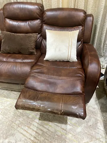 Brown leather recliner armchair in excellent condition. 2 seater.