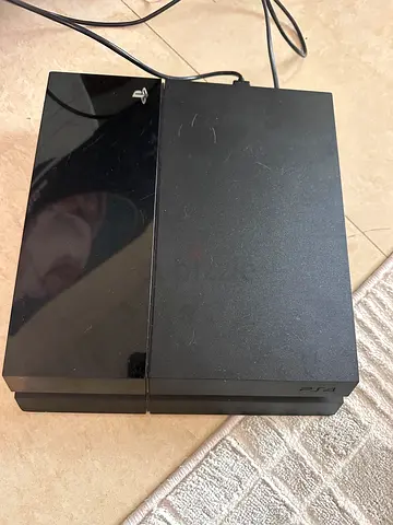ps4 good condition and a ps4 controller