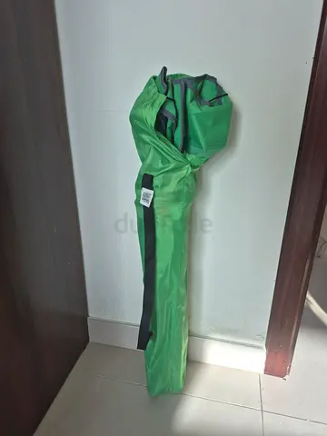 Foldable camping chair with cover.