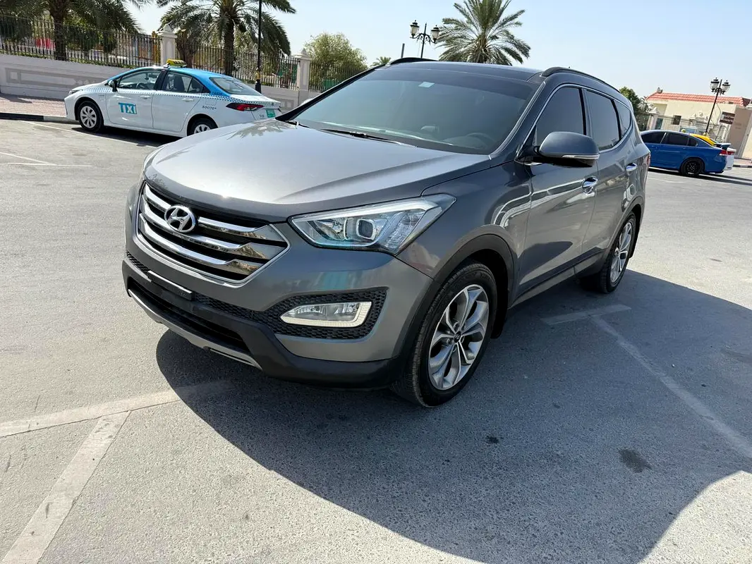 Hyundai Santa Fe 2015 — photo 1 of 18