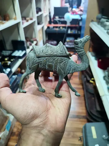 Handheld Brass Camel Figurine with Carved Saddle Detail