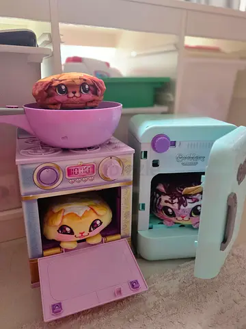 Cute Cookeez Makery play kitchen appliances toy set with oven, fridge, pan and plush toy.