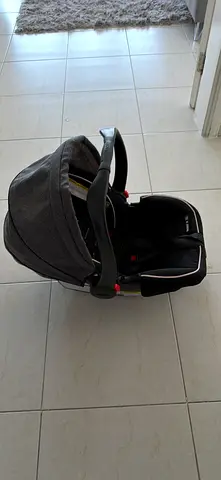 Used infant car seat (rear-facing) with canopy - good condition