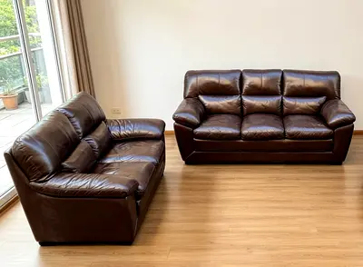 Sofa Brown Leather 5 Seater good condition