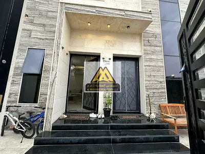 A fully furnished luxury villa available for annual rent in Al Helio 2, Ajman. The property features elegant finishing,