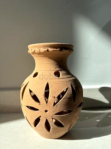Hand-carved Terracotta Decorative Vase with Floral Cutouts - Made in Oman