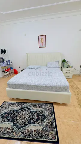 Queen-size upholstered bed with mattress - excellent condition