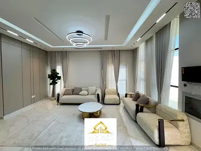 Villa for sale next to the mosque and near Sheikh Mohammed Bin Zayed Road, excellent finishing at an attractive price including registration fees and