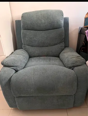 Comfortable single reclining armchair - light teal fabric