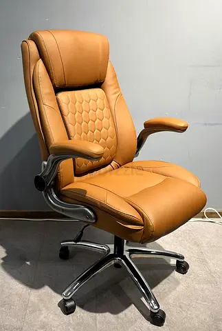 brown leather chair with flipup/lumber
